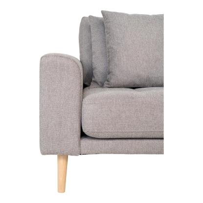 Lounge sofa, højrevendt i lysegrå med fire puder
